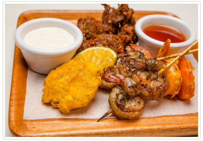 Usain Bolt Places to eat in Jamaica Restaurants in Jamaica Jamaican food Jamaican food recipes Red Stripe Beer Jerk Chicken